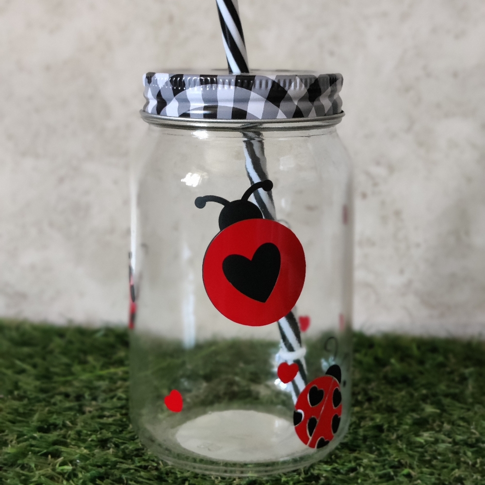 Ladybug drinking jar with a straw and metal lid